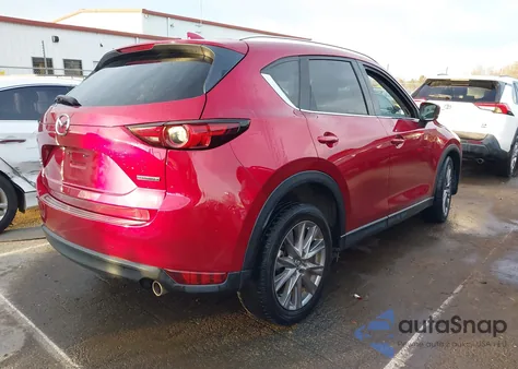 2021 Mazda Cx-5 Grand Touring z USA, uszkodzony, nr VIN JM3KFBDM2M0432134